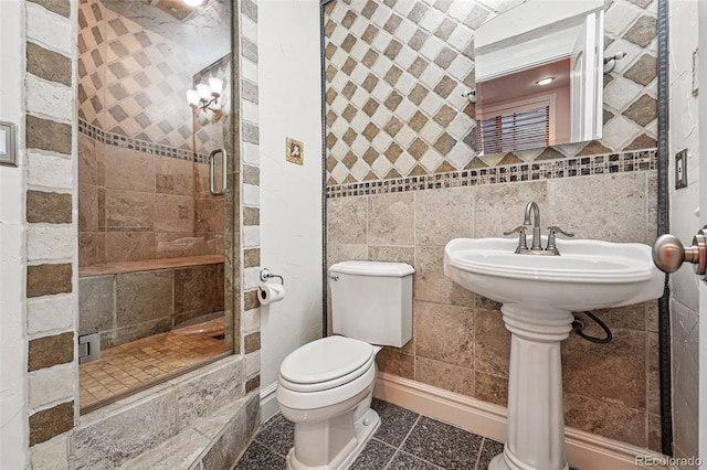 2319 Decatur St, Denver, CO 80211 - bathroom featuring a stall shower, tile walls, and tile patterned floors