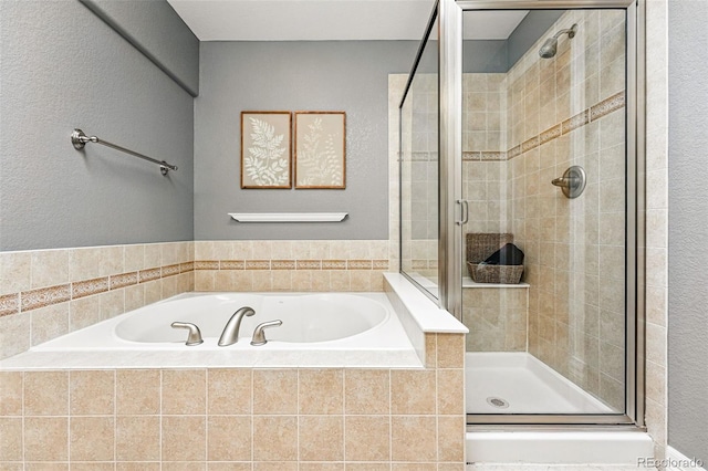 2319 Decatur St, Denver, CO 80211 - full bath with a bath, a stall shower, and a textured wall