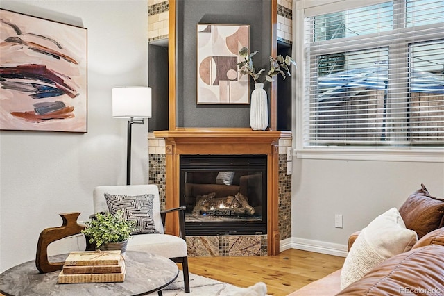 2319 Decatur St, Denver, CO 80211 - living area with wood finished floors and a glass covered fireplace