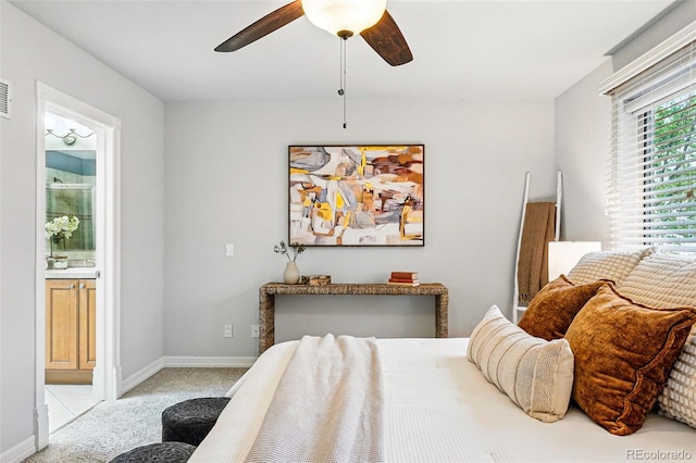 2319 Decatur St, Denver, CO 80211 - bedroom featuring light colored carpet, ensuite bath, and ceiling fan