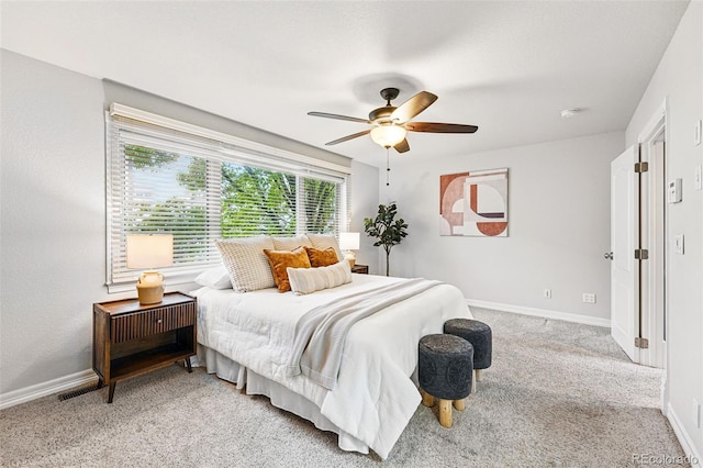 2319 Decatur St, Denver, CO 80211 - bedroom with a ceiling fan and light carpet