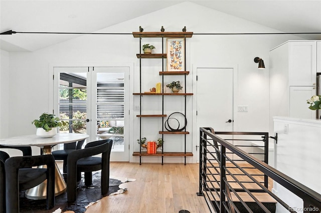 1920 S Niagara St, Denver, CO 80224 - dining area with lofted ceiling and light wood-style floors