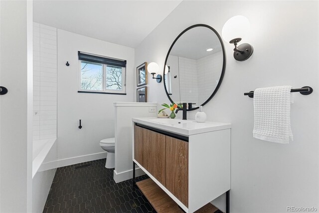 1920 S Niagara St, Denver, CO 80224 - full bathroom featuring vanity and  shower combination