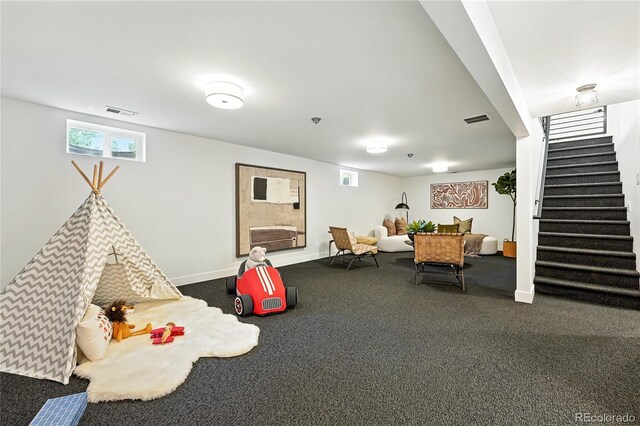 1920 S Niagara St, Denver, CO 80224 - game room with baseboards and dark colored carpet