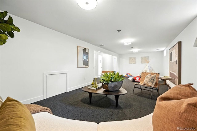 1920 S Niagara St, Denver, CO 80224 - living room featuring carpet floors and baseboards