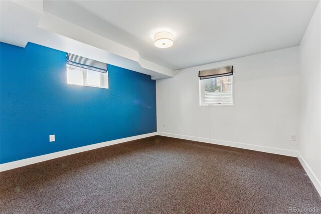 1920 S Niagara St, Denver, CO 80224 - unfurnished room featuring baseboards and dark carpet