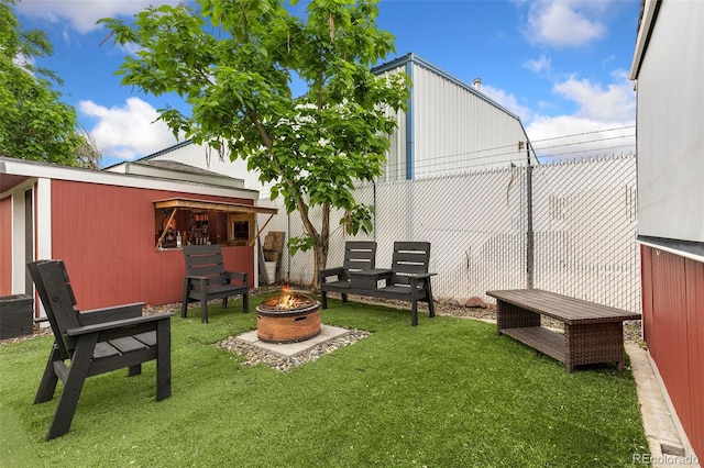 805 5th St, Fort Lupton, CO 80621 - view of grassy yard with a fire pit