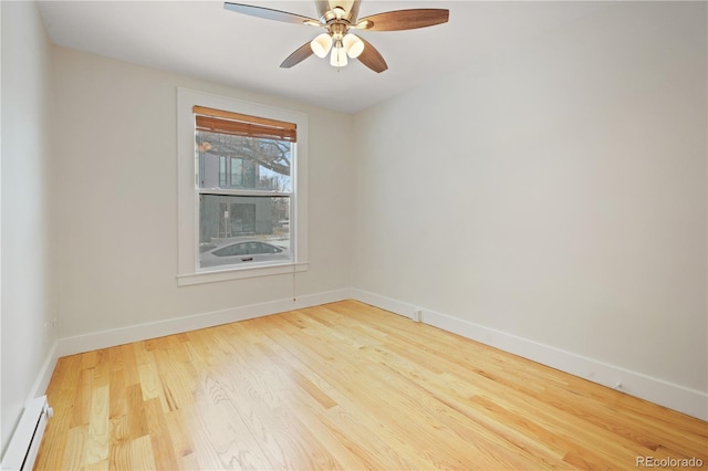 unfurnished room featuring baseboard heating, ceiling fan, and hardwood / wood-style flooring