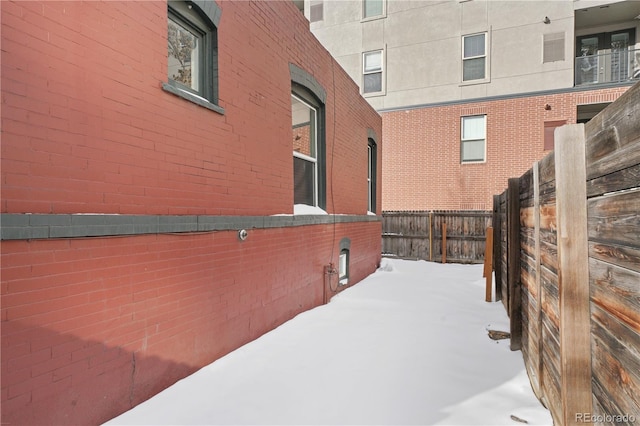 view of snow covered property