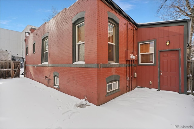 view of snow covered property