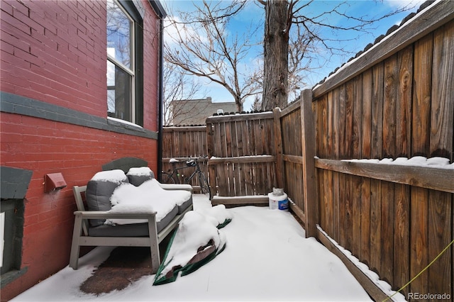 view of snow covered patio