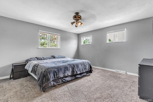 6441 W 73rd Pl, Arvada, CO 80003 - carpeted bedroom featuring baseboards and a ceiling fan