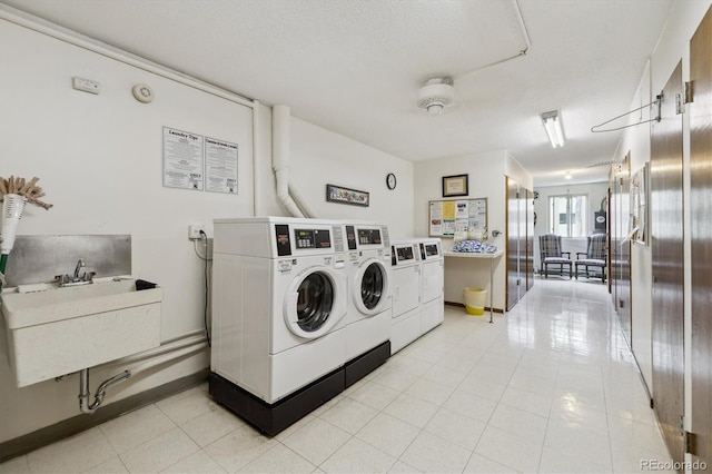 715 S Alton Way Unit 5D, Denver, CO 80247 - community laundry featuring washer and dryer