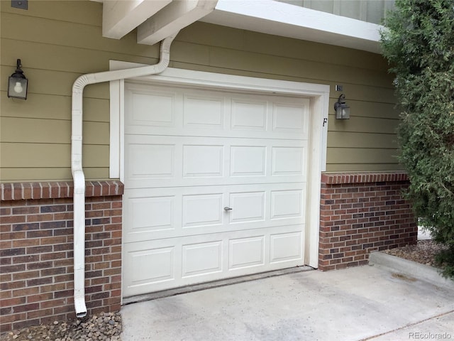 11947 Riverstone Cir Unit 7F, Henderson, CO 80640 - garage with concrete driveway