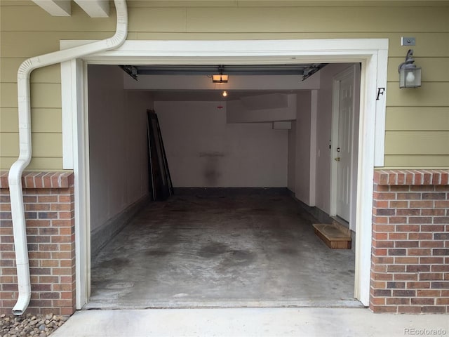 11947 Riverstone Cir Unit 7F, Henderson, CO 80640 - garage featuring a garage door opener