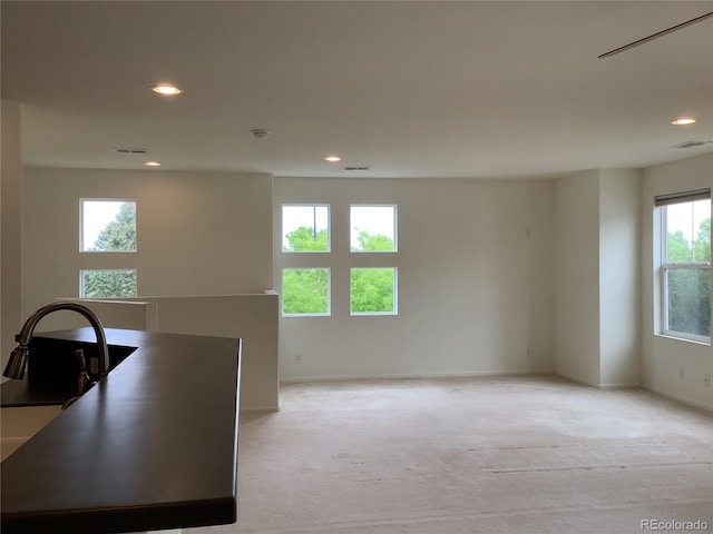 11947 Riverstone Cir Unit 7F, Henderson, CO 80640 - unfurnished office featuring a sink, light colored carpet, recessed lighting, and baseboards