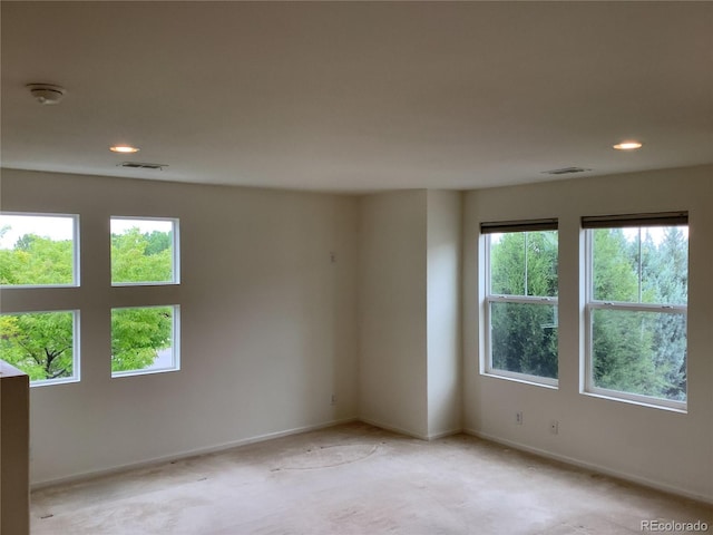 11947 Riverstone Cir Unit 7F, Henderson, CO 80640 - empty room featuring light carpet, a smoke detector, baseboards, and recessed lighting
