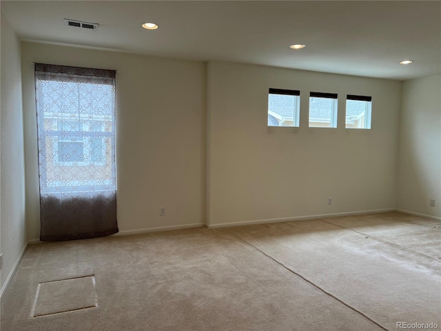 11947 Riverstone Cir Unit 7F, Henderson, CO 80640 - spare room featuring light colored carpet, recessed lighting, and baseboards