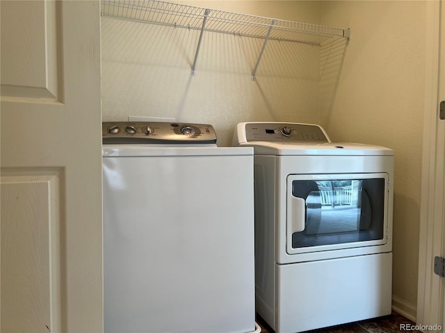 11947 Riverstone Cir Unit 7F, Henderson, CO 80640 - washroom featuring separate washer and dryer