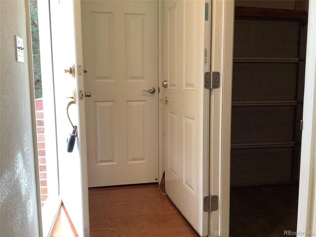 11947 Riverstone Cir Unit 7F, Henderson, CO 80640 - corridor with light wood-style flooring