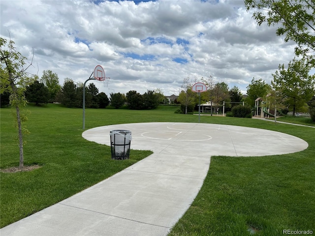 11947 Riverstone Cir Unit 7F, Henderson, CO 80640 - view of basketball court featuring community basketball court and a lawn