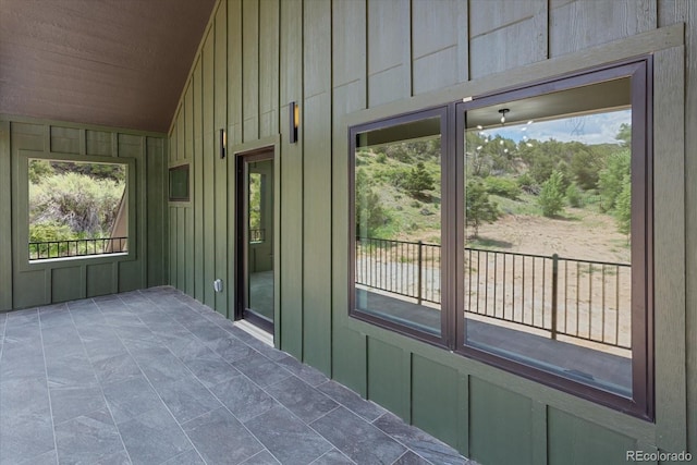 exterior space with lofted ceiling