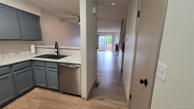 1818 S Quebec Way Unit 5-7, Denver, CO 80231 - kitchen with dishwasher, gray cabinetry, a sink, light wood-style floors, and a ceiling fan