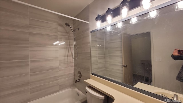 1818 S Quebec Way Unit 5-7, Denver, CO 80231 - bathroom featuring shower / washtub combination, toilet, and vanity