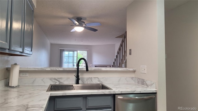 1818 S Quebec Way Unit 5-7, Denver, CO 80231 - kitchen with dishwasher, a sink, a textured ceiling, gray cabinets, and a ceiling fan