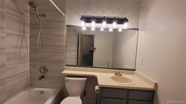 1818 S Quebec Way Unit 5-7, Denver, CO 80231 - bathroom with tub / shower combination, toilet, and vanity
