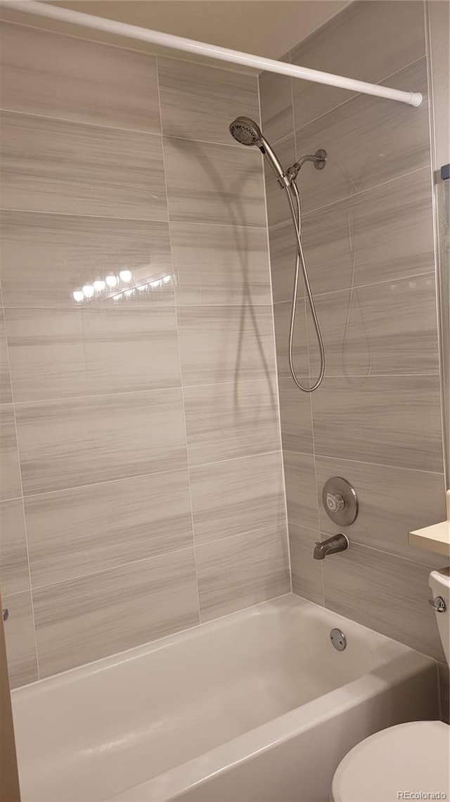 1818 S Quebec Way Unit 5-7, Denver, CO 80231 - full bath featuring toilet, tub / shower combination, and vanity