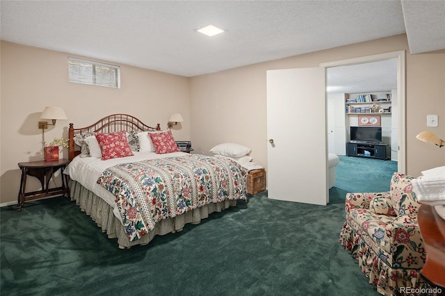 carpeted bedroom with a textured ceiling