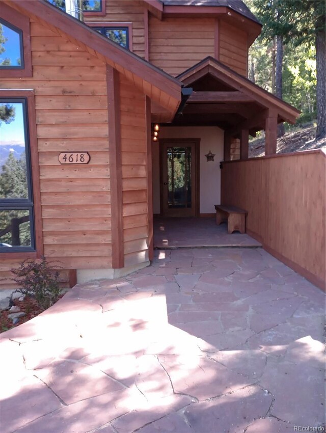 4618 SE Summit Trl, Evergreen, CO 80439 - entrance to property with a patio area