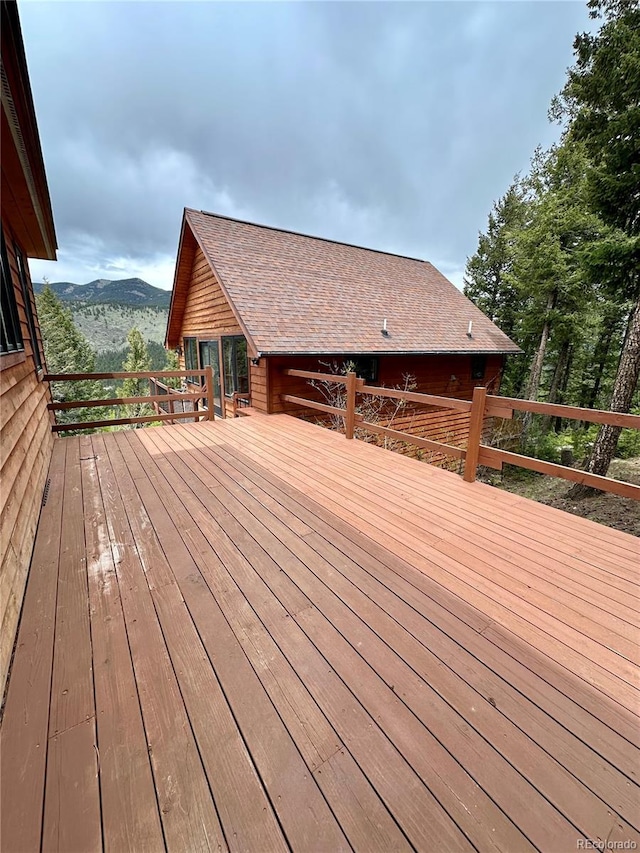 4618 SE Summit Trl, Evergreen, CO 80439 - wooden deck featuring a mountain view