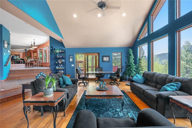 4618 SE Summit Trl, Evergreen, CO 80439 - living area with hardwood / wood-style flooring, high vaulted ceiling, ceiling fan, and recessed lighting