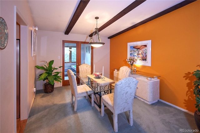 2141 S Dallas St, Denver, CO 80231 - carpeted dining room with beam ceiling and french doors