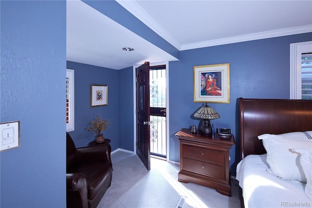 2141 S Dallas St, Denver, CO 80231 - bedroom featuring carpet floors, access to exterior, and ornamental molding