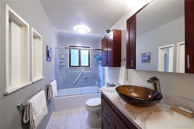 2141 S Dallas St, Denver, CO 80231 - bathroom with vanity, combined bath / shower with glass door, and tile patterned flooring