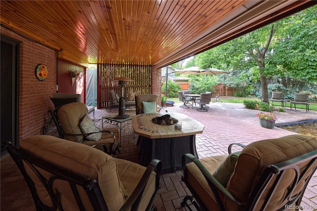 2141 S Dallas St, Denver, CO 80231 - fenced backyard with a patio area, an outdoor living space with a fire pit, and outdoor dining area