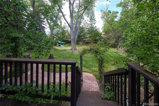 2141 S Dallas St, Denver, CO 80231 - wooden terrace with a yard