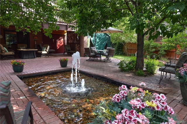 2141 S Dallas St, Denver, CO 80231 - wooden terrace with a patio and an outdoor fire pit
