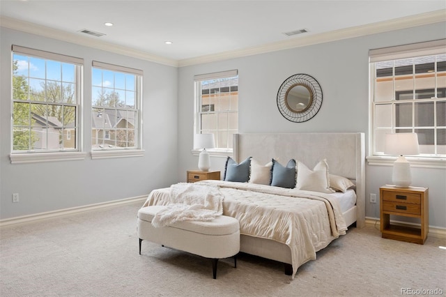 bedroom with crown molding, light colored carpet, baseboards, and recessed lighting