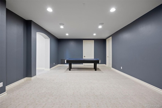 recreation room with recessed lighting, arched walkways, carpet, and baseboards