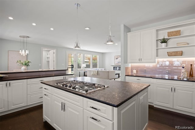 2500 S Monroe St, Denver, CO 80210 - kitchen featuring dark countertops, stainless steel gas cooktop, open shelves, recessed lighting, and dark wood-style flooring