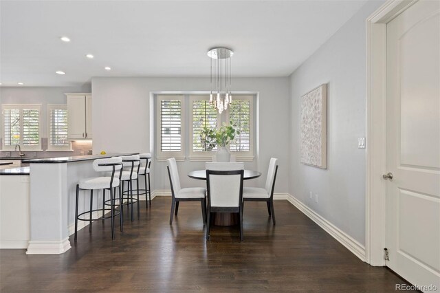 2500 S Monroe St, Denver, CO 80210 - dining room with dark wood-style flooring, recessed lighting, and baseboards
