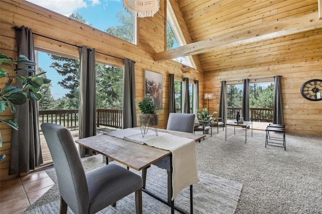 sunroom / solarium featuring lofted ceiling and wood ceiling