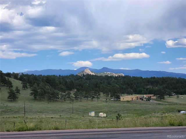 view of mountain feature featuring a rural view