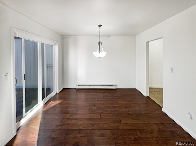 unfurnished dining area with plenty of natural light, a baseboard radiator, and dark hardwood / wood-style floors