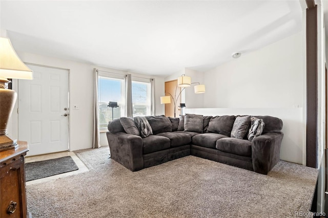 living area featuring light colored carpet