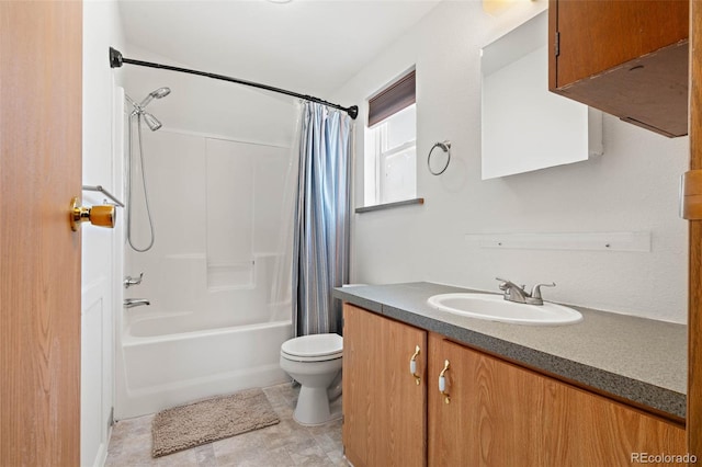 full bath featuring toilet, vanity, and shower / bath combo